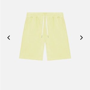 John Elliott crimson shorts sz xl in toxic yellow.  NWT